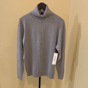 Calvin Klein Woman’s Turtleneck Sweater in Light Gray